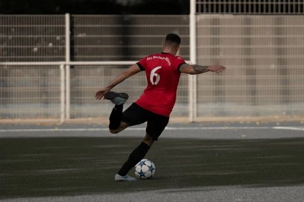 football player shooting goal